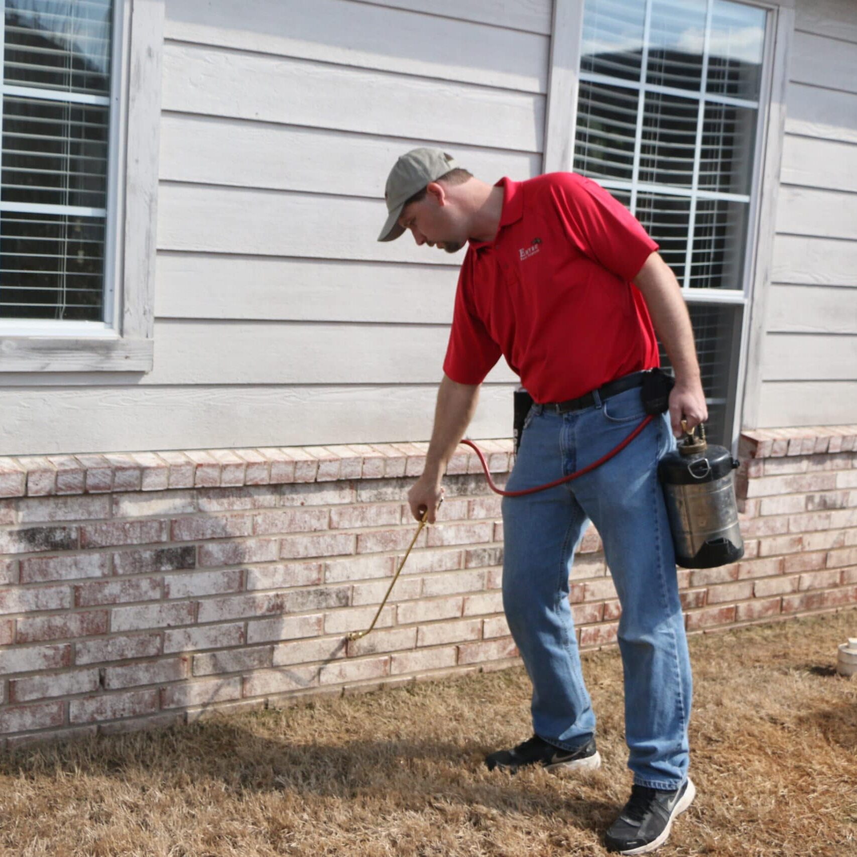 Emtec staff working outside of the house