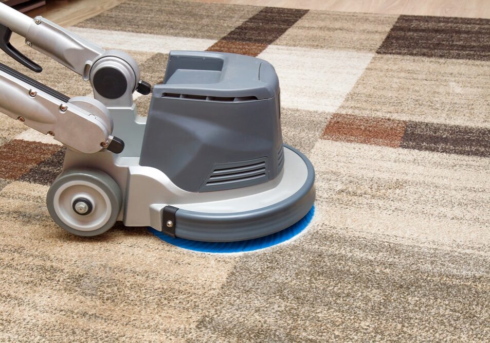 Carpets chemical cleaning with professionally disk machine.