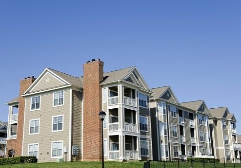Three story apartment building